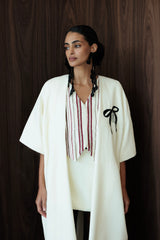 Love rests here coat