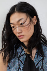 Flight in blue scarf