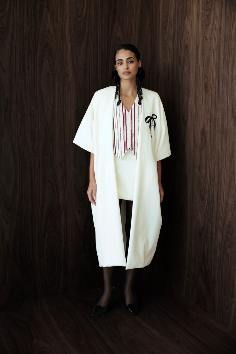 Love rests here coat