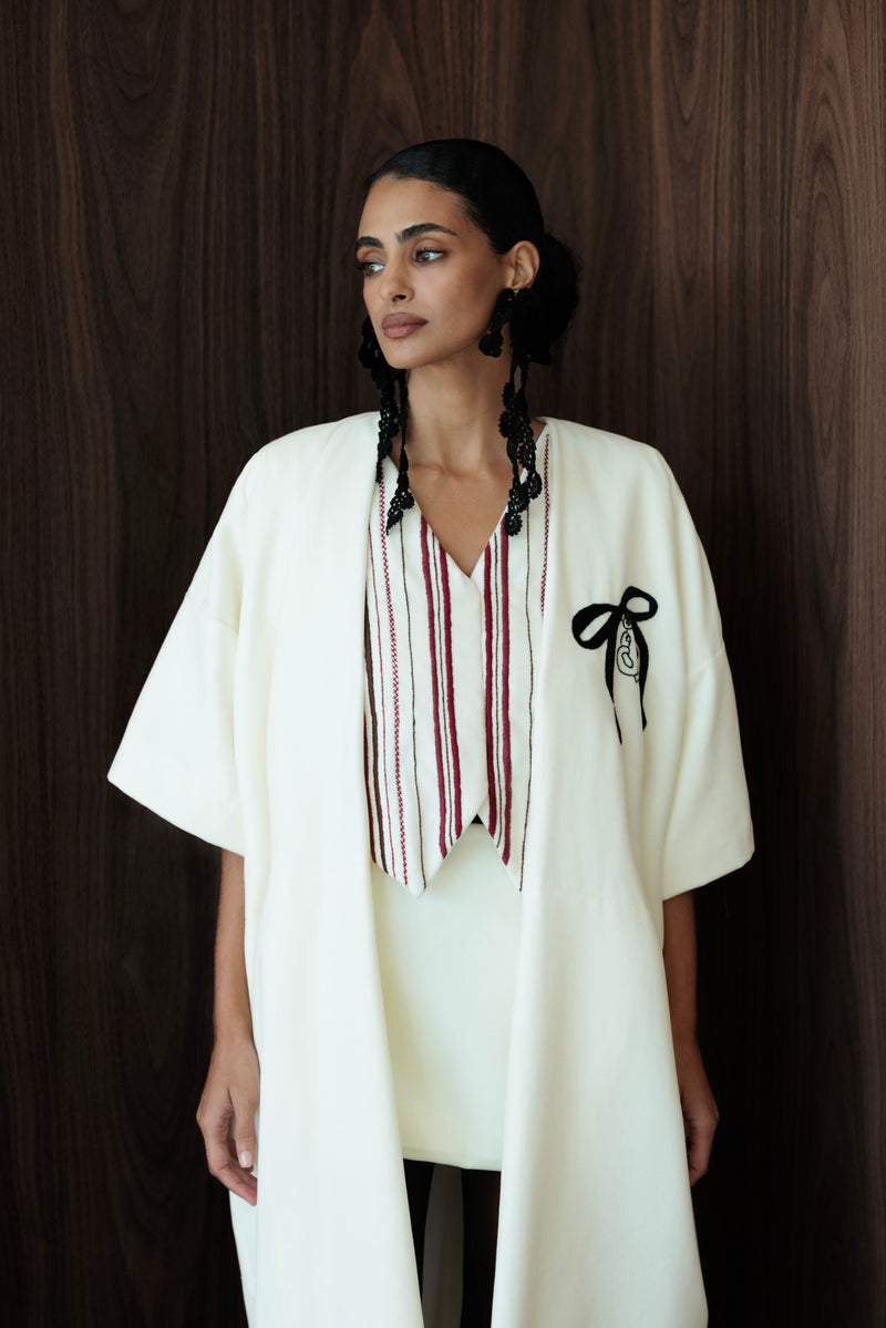 Love rests here coat