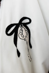 Love rests here coat