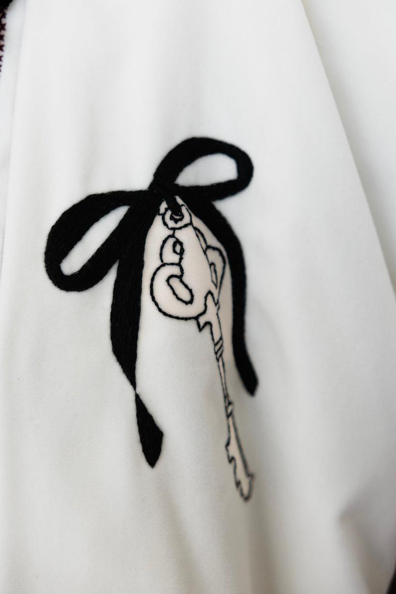 Love rests here coat