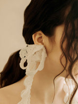 Rewards earings in White